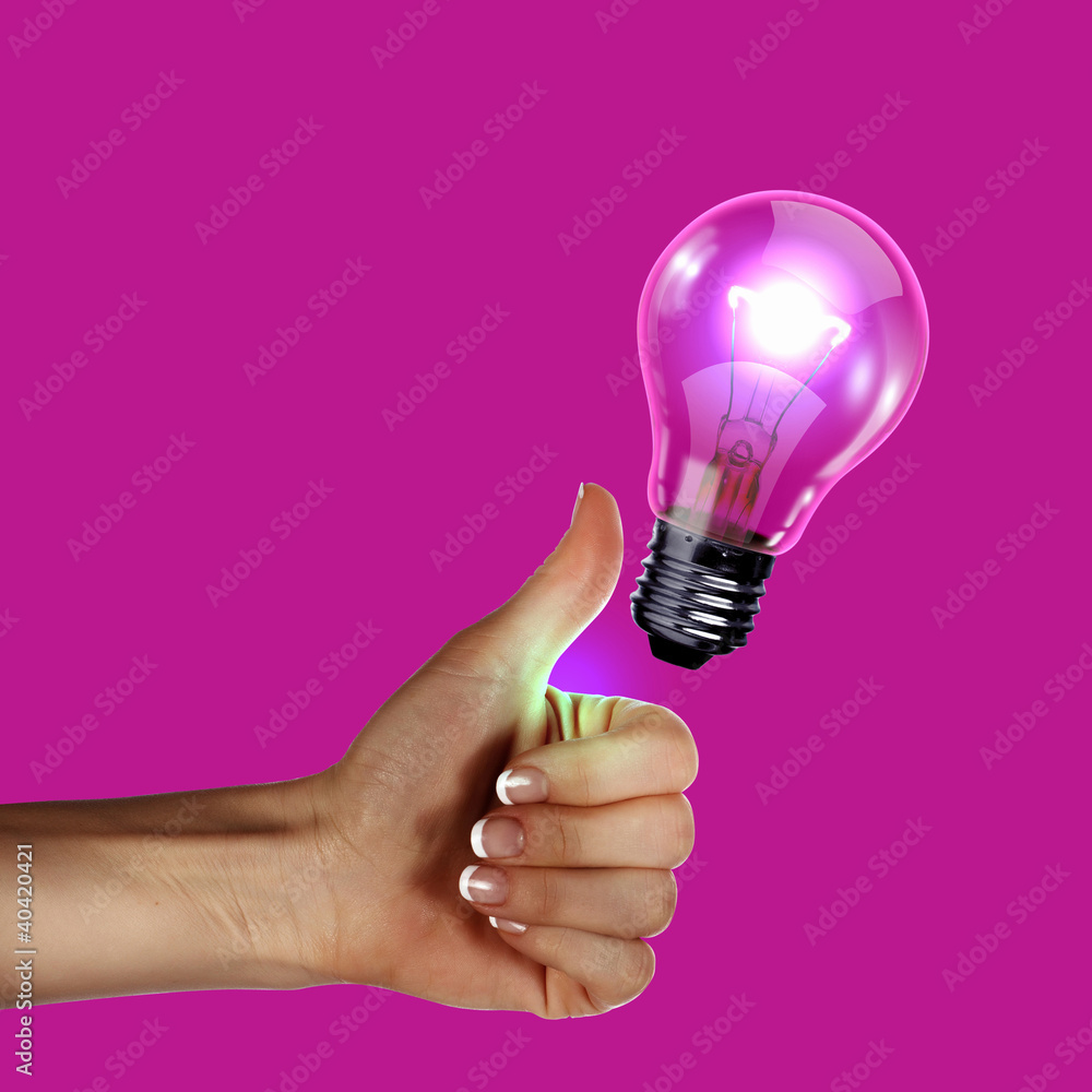 Human hand holding electric bulb Human hand holding electric bulb