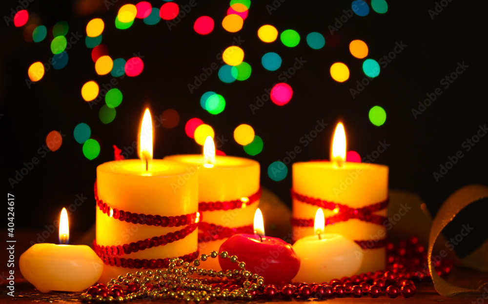 Beautiful candles and decor on wooden table on bright background Beautiful candles and decor on wooden table on bright background