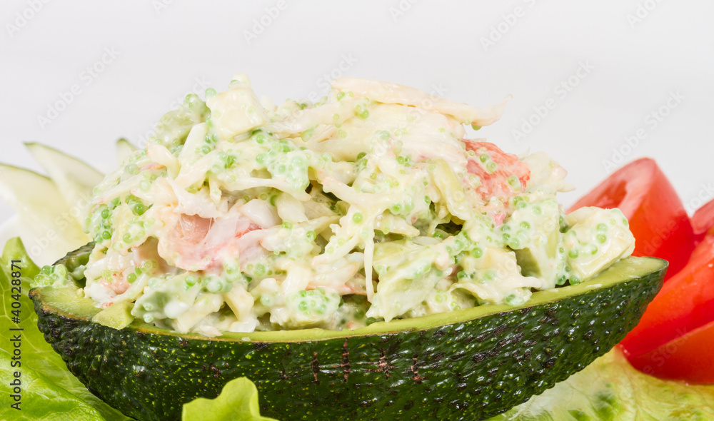 Crab meat salad with green caviar in avocado - japan cusine Crab meat salad with green caviar in avocado - japan cusine