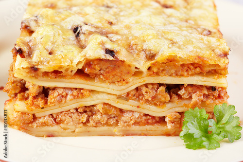 Italian cuisine. Meat lasagna closeup photo