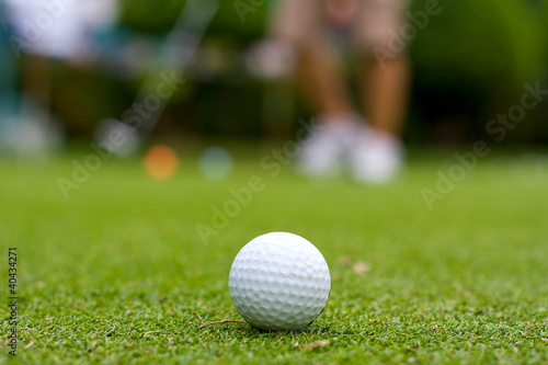 Golf ball and grass
