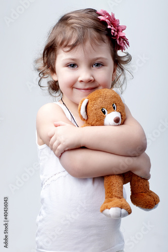 Little girl with toy
