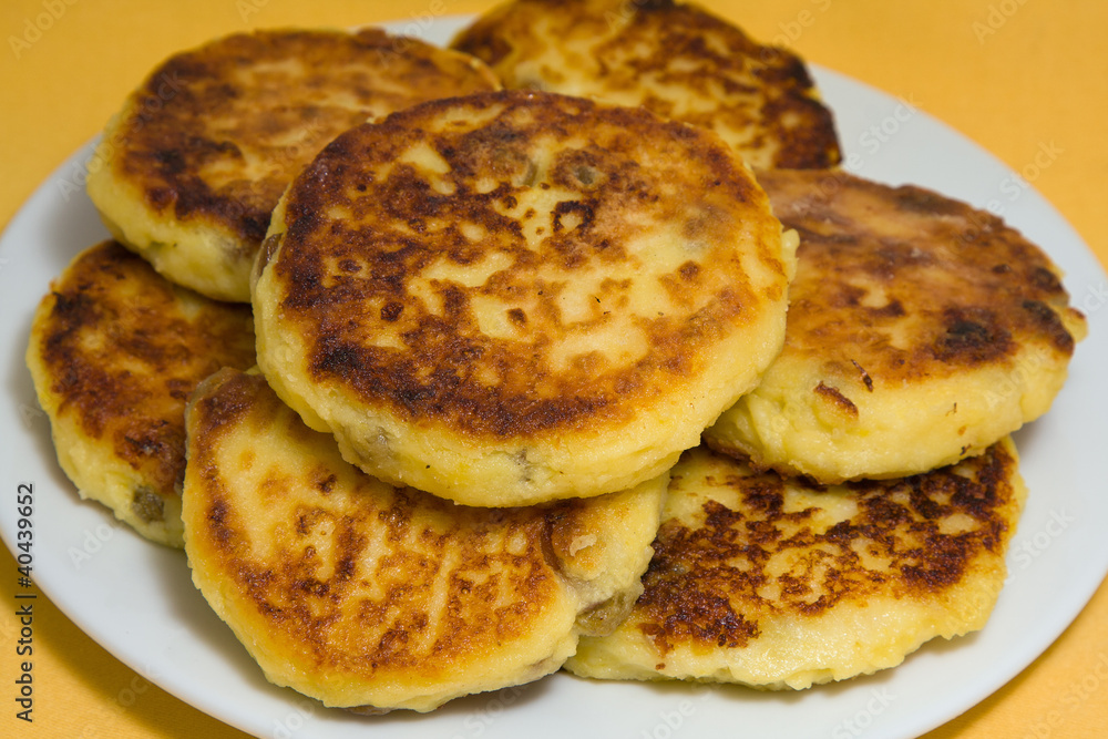 Sweet cheese pancakes on a plate Sweet cheese pancakes on a plate