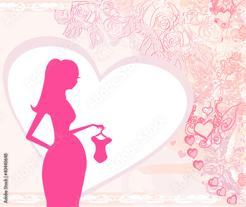Beautiful pregnant woman on shopping - abstract background