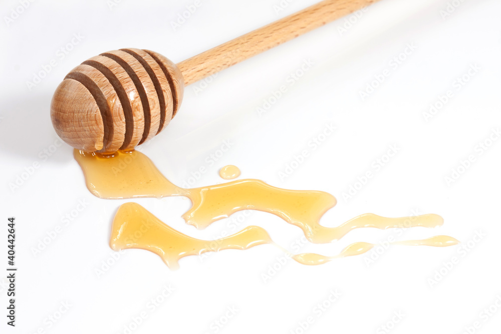 Honey and wood dipper Honey and wood dipper