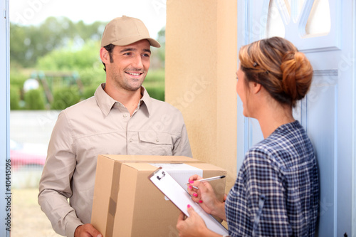 Courier delivering a parcel photo