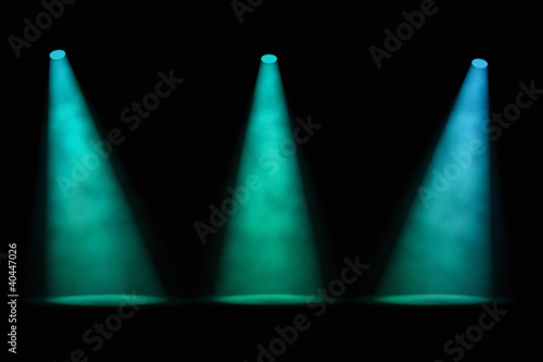 Three Separate Blue-green Spotlights