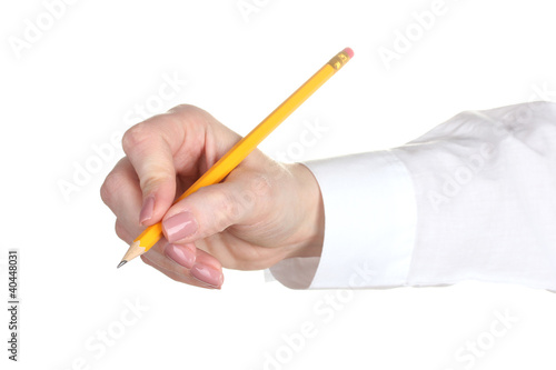 Woman hand with pencil isolated on white