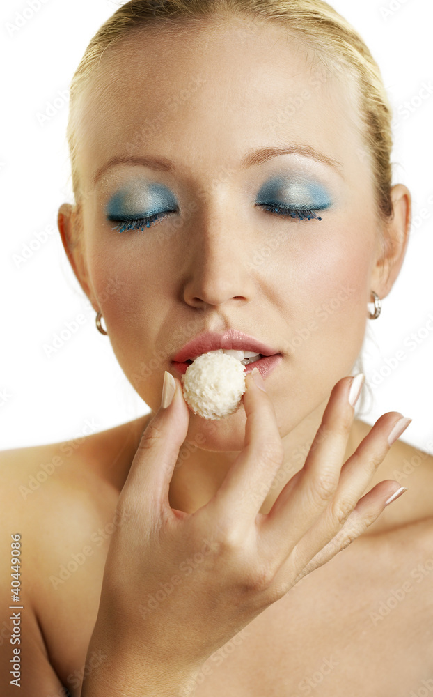 Young woman tasting sweets Young woman tasting sweets