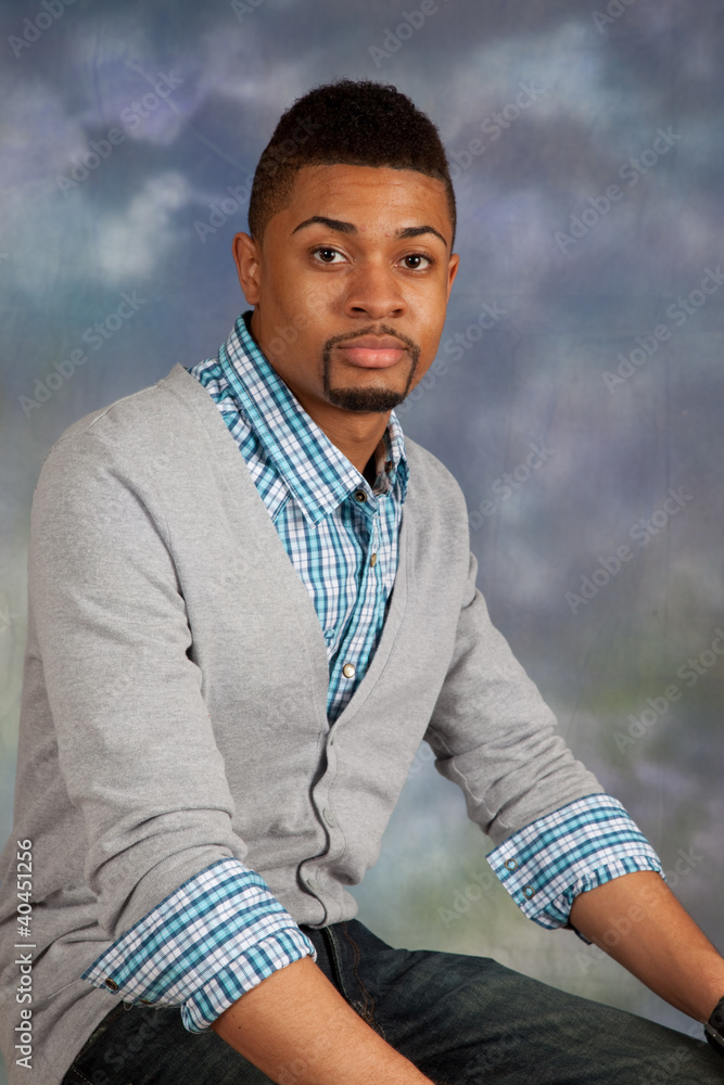 black man looking thoughtful at the camera black man looking thoughtful at the camera
