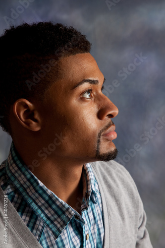 black man looking thoughtful