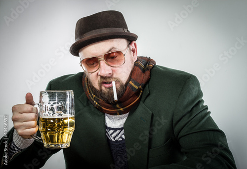 Drunk Man at Bar With Beer and Cigarette