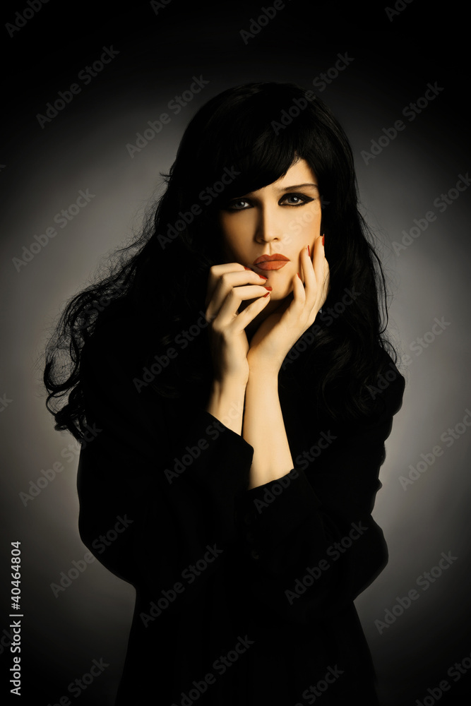 Fashion portrait elegant brunette woman in black Fashion portrait elegant brunette woman in black
