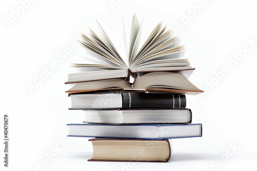 A stack of books on a white background. © trotzolga