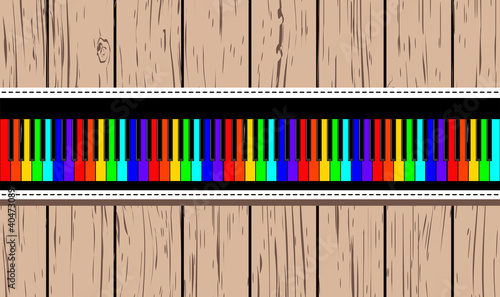 Wooden card with rainbow piano.