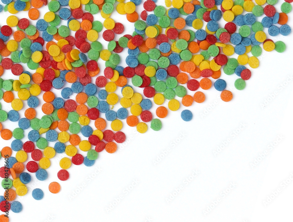Colored sugar circles on a white background Colored sugar circles on a white background