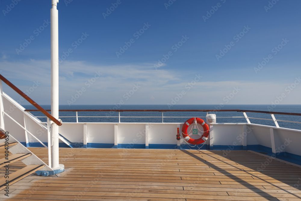 Wooden wharf,buoy and blue Sky