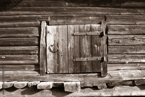 wooden door in rural barn, sepia #40482621