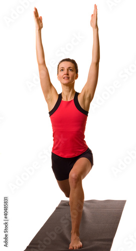 young woman exercising isolated on a white background.
