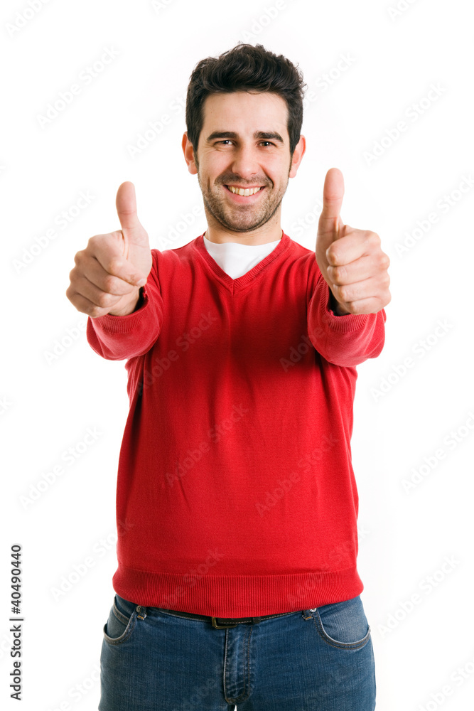 A smiling man showing thumb up sign, isolated on white backgroun A smiling man showing thumb up sign, isolated on white backgroun