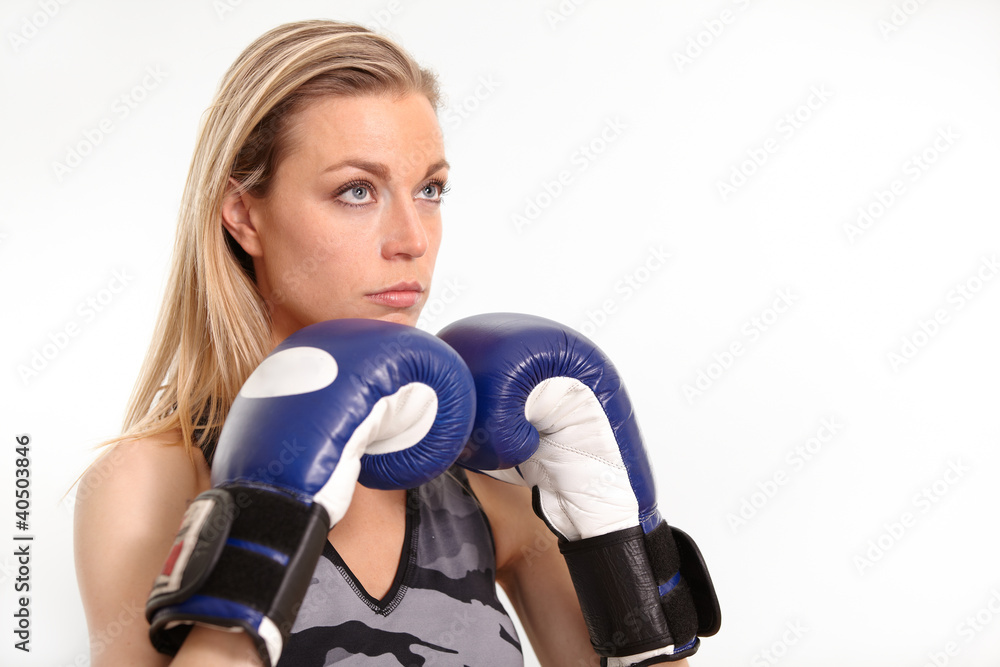 Beautiful young woman with boxing gloves Beautiful young woman with boxing gloves