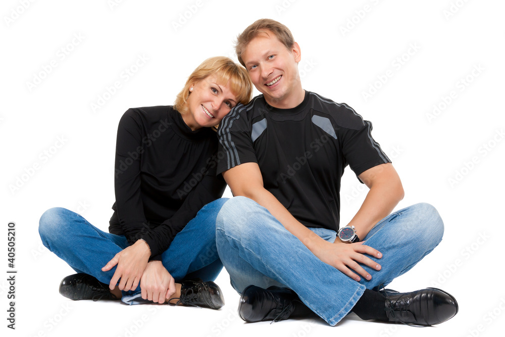 Beautiful couple in love sitting in the lotus position Beautiful couple in love sitting in the lotus position