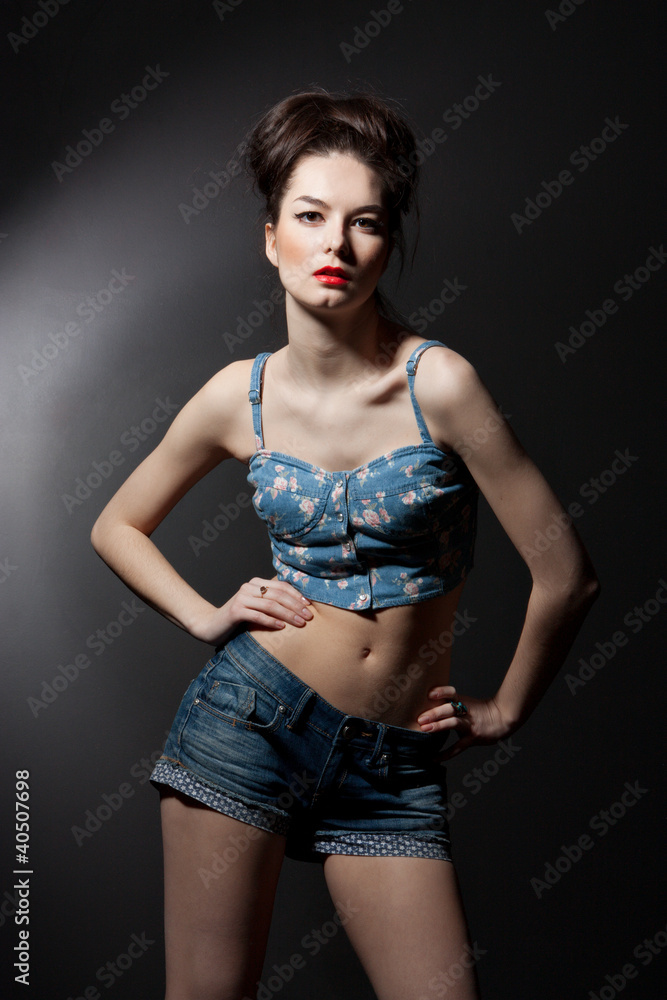 young woman on dark background