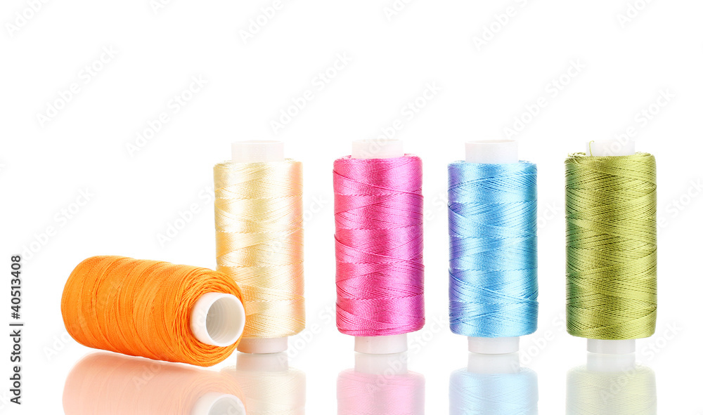Many spools of thread isolated on white Many spools of thread isolated on white