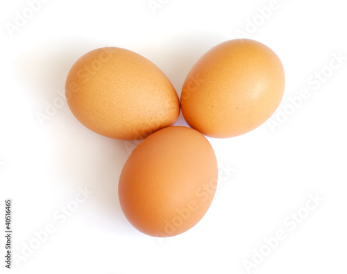 Three eggs isolated on white background