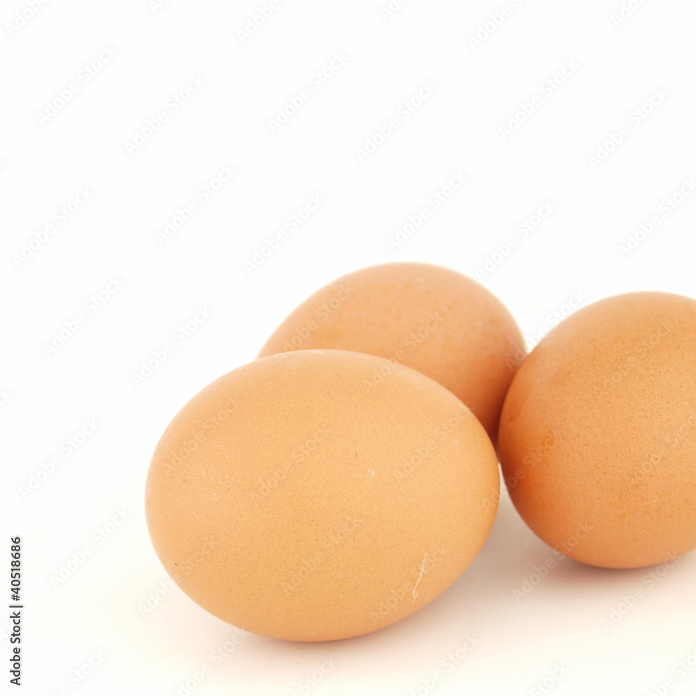 Three brown eggs isolated on white background Three brown eggs isolated on white background