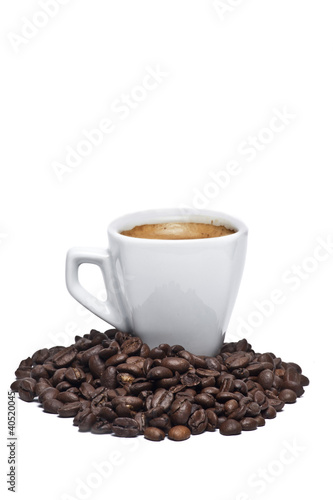 Coffee cup and coffee beans © ramoncin1978