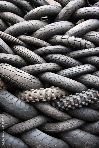 Foto Pattern made by stacked motorcycle tyres