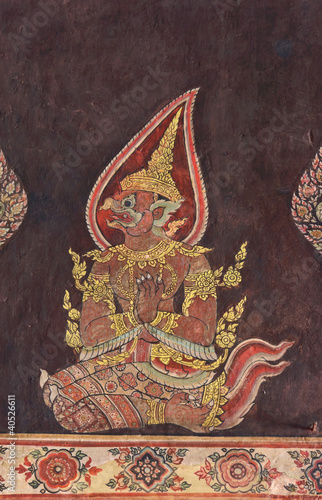 Vintage Buddhist Thai style art painting on temple wall