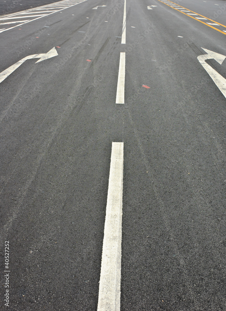 Turn direction lane mark on road.