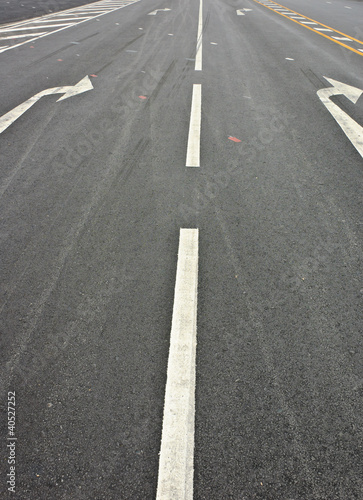 Turn direction lane mark on road.