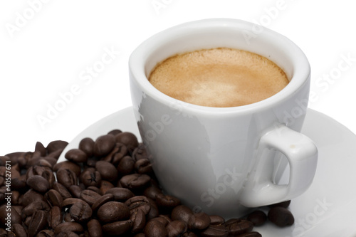 Coffee cup and coffee beans © ramoncin1978