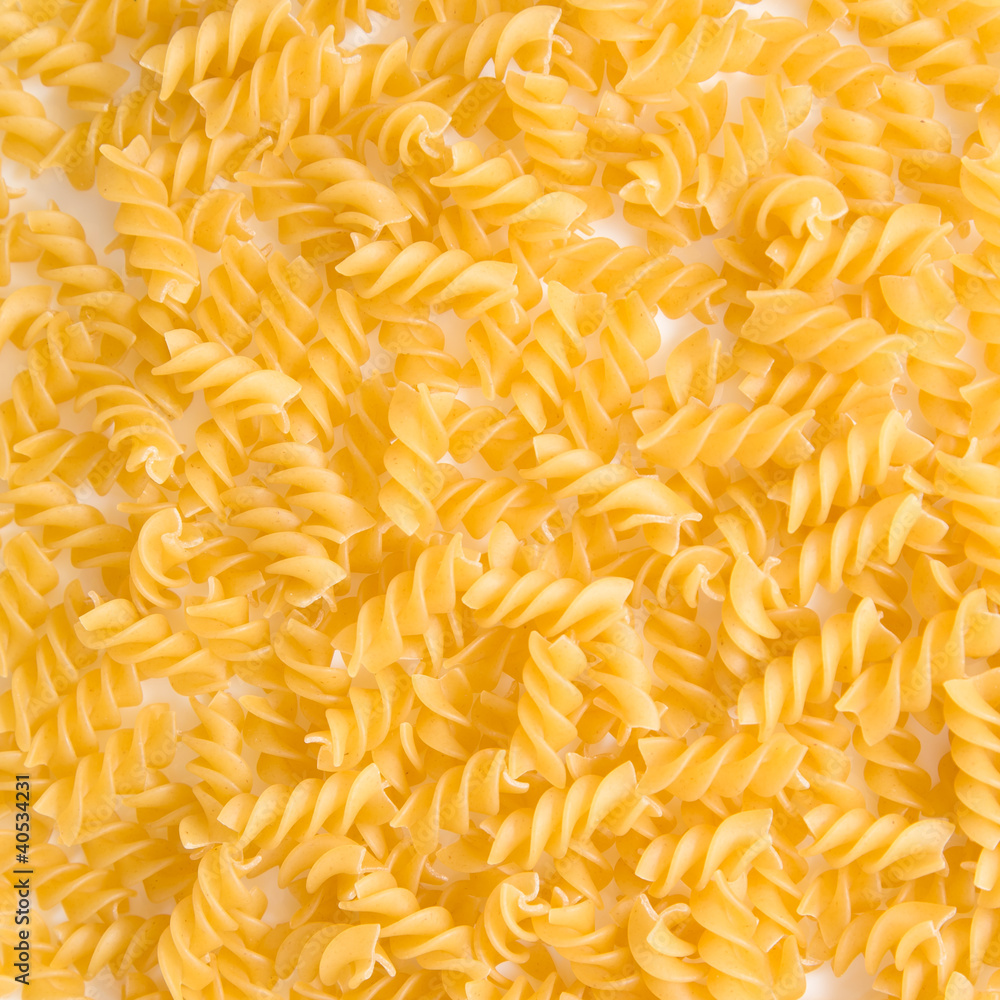 Closeup of Uncooked Italian Spiral Pasta Rotini Closeup of Uncooked Italian Spiral Pasta Rotini