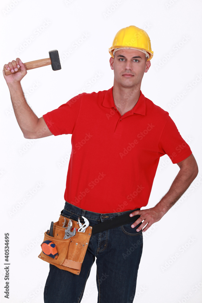 Construction worker with a mallet Construction worker with a mallet