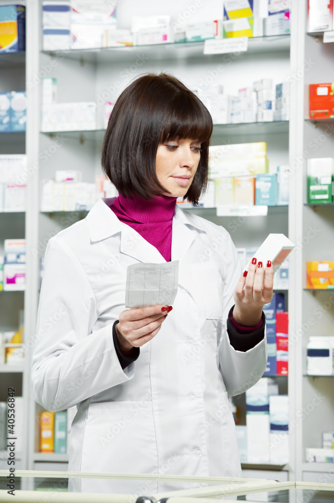 Pharmacy chemist woman in drugstore Pharmacy chemist woman in drugstore