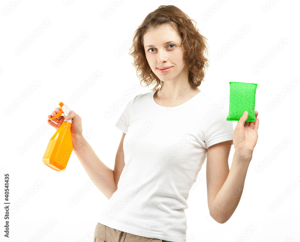 Attractive young woman holding cleaning supplies Attractive young woman holding cleaning supplies