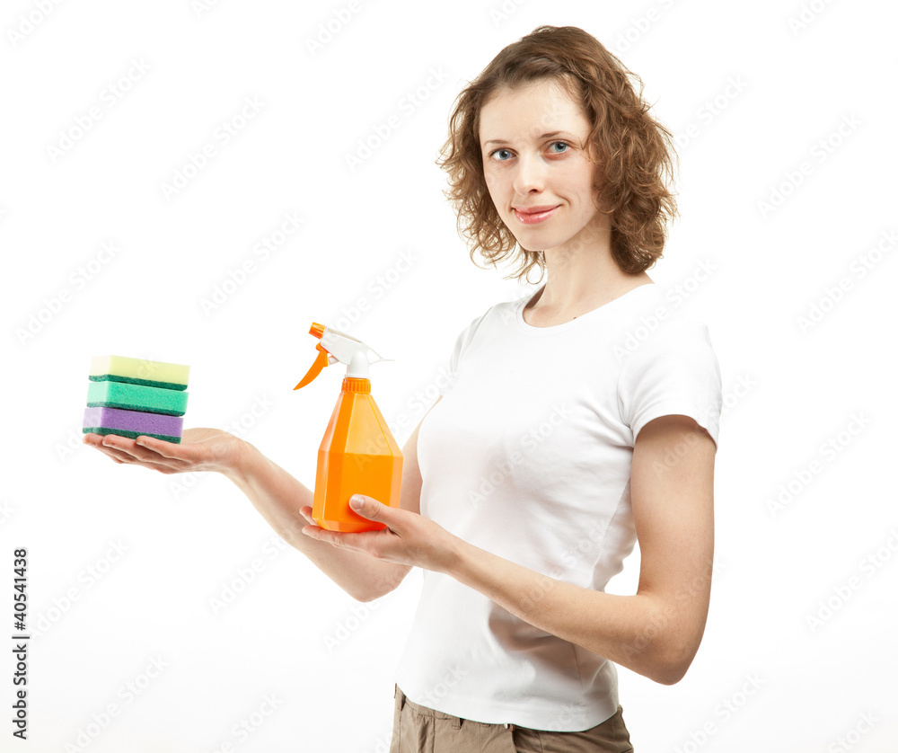 Attractive young woman holding cleaning supplies Attractive young woman holding cleaning supplies