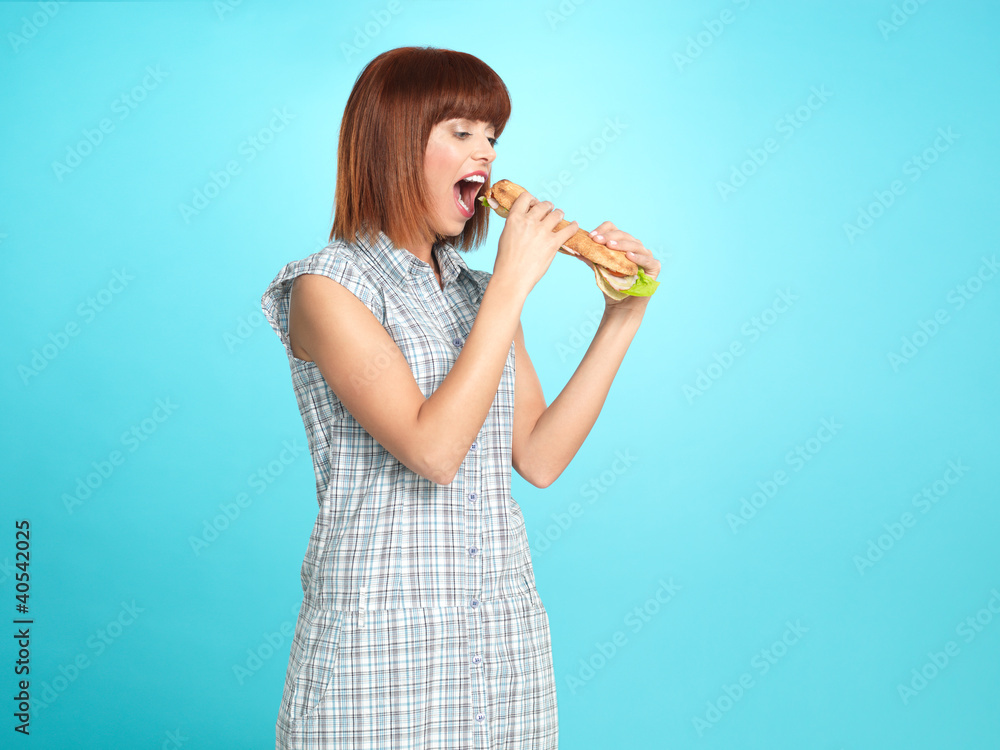 beautiful young woman eating a big sandwich beautiful young woman eating a big sandwich