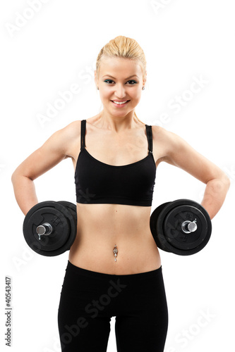 Athletic young lady working out with weights