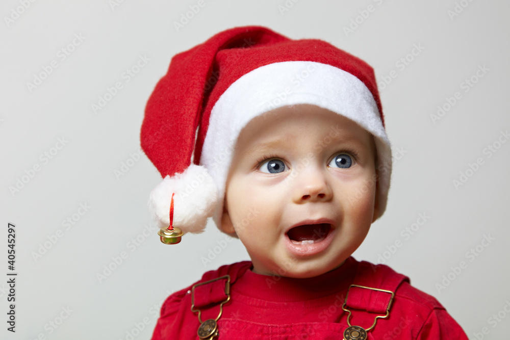 Staunendes Baby an Weihnachten Staunendes Baby an Weihnachten