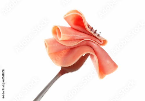 Slice of ham on fork