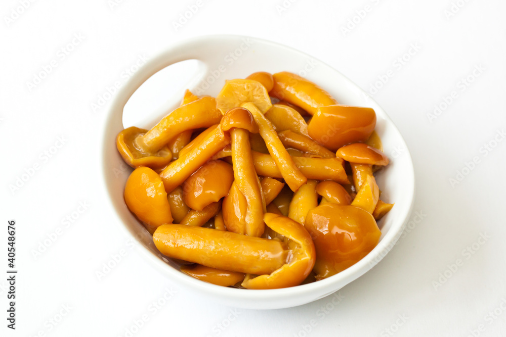 Pickled Mushrooms in white bowl Pickled Mushrooms in white bowl