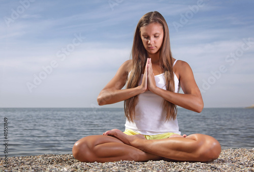 beauty girl in lotus pose