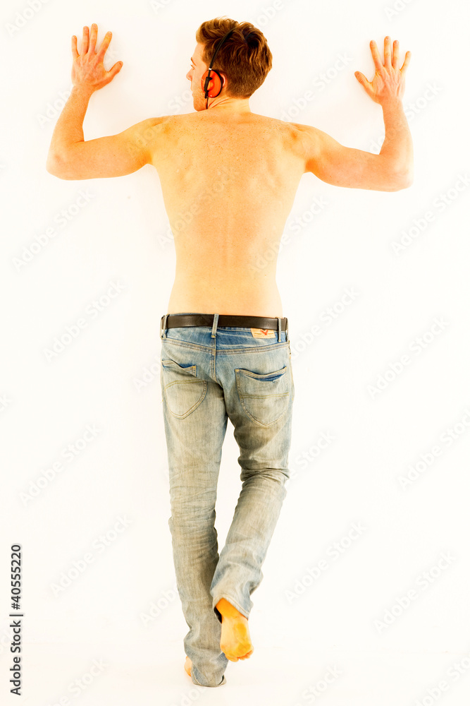 bare-chested man with headphones bare-chested man with headphones