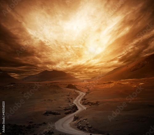 Dramatic sky over road in a valley.