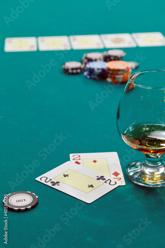 Принти на полотні a glass of liquor and cards and dollars
